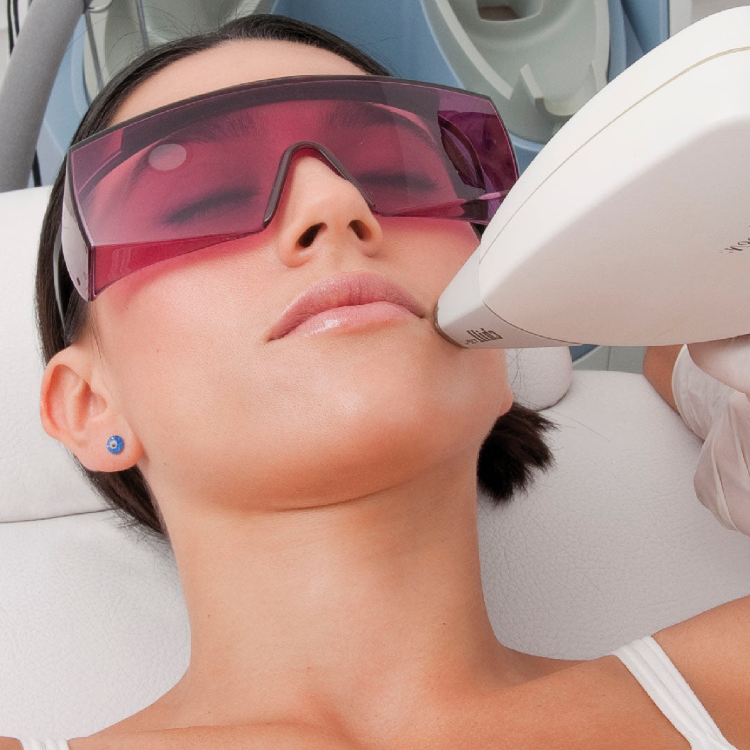 Gafas para depilacion laser fotografías e imágenes de alta